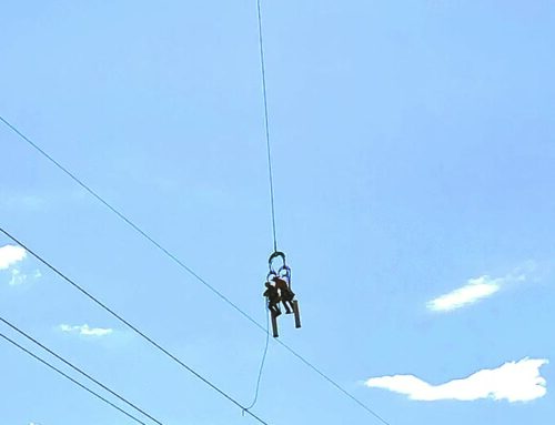 Not afraid of heights: Linemen dangling from helicopter repair power lines in eastern Polk County