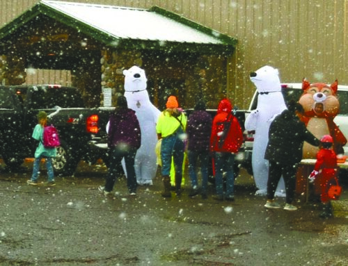 Trick-or-treaters brave snowy conditions in Siren and Webster