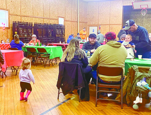 Santa makes an appearance for breakfast with the Dresser Lions Club