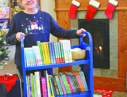 Santa has a helper at the Larsen Family Library