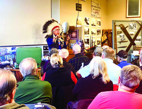 Chief Dan Mosay of the St. Croix Band of Lake Superior Chippewa speaks at the Luck Museum