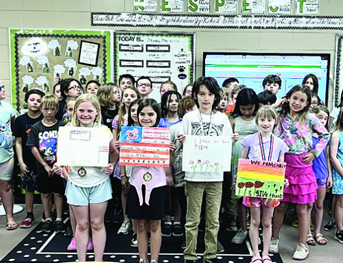 Webster third grade recognize poppies, Memorial Day and veterans