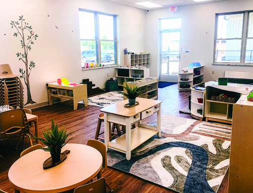 The Grove Childcare Center cuts the ribbon at their new building