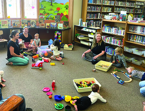 Play and Learn group helps to foster early childhood development at Luck Library